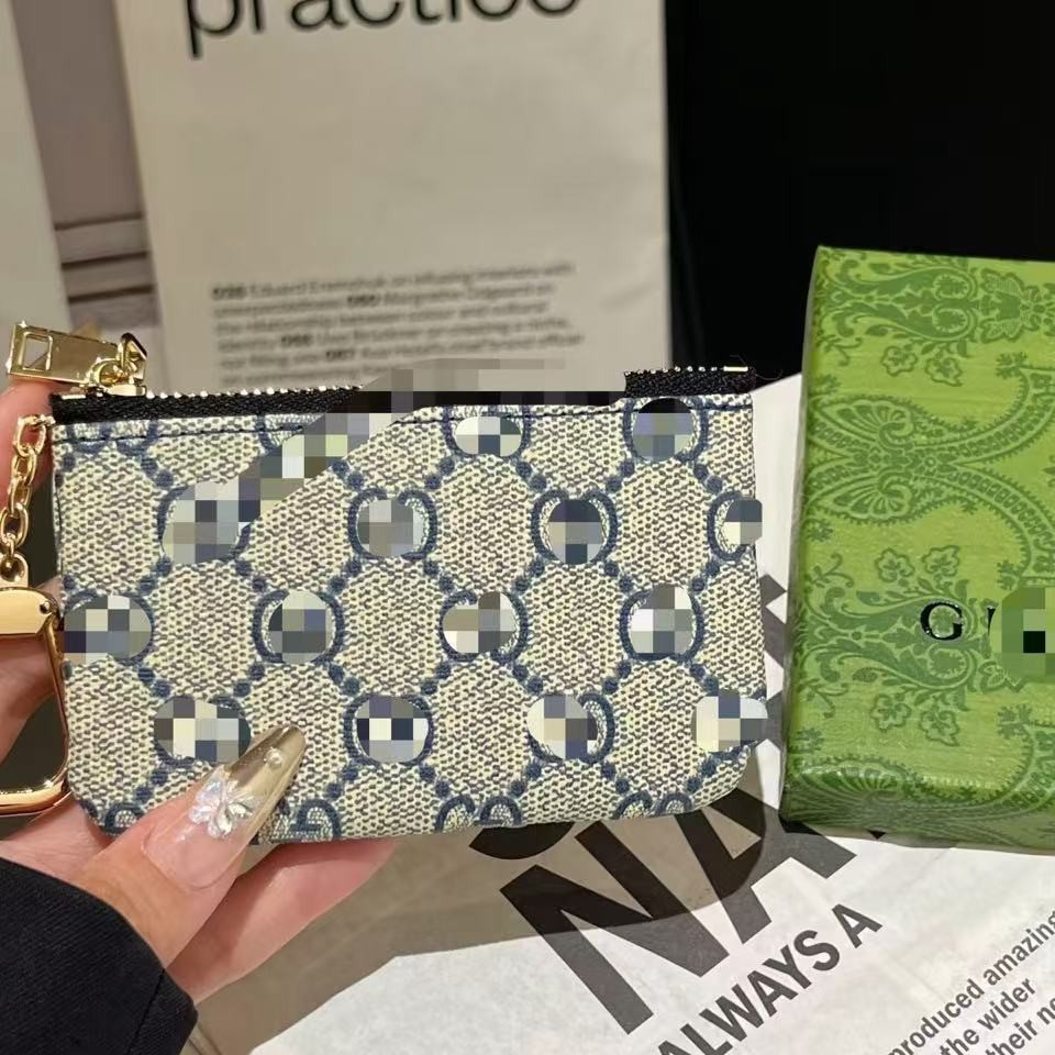 Fabricantes lotes de bolsas de cambio bolsas de lápiz labial bolsas de llaves colgantes bolsas de tarjetas de moda europeas y estadounidenses colgantes abejas GG