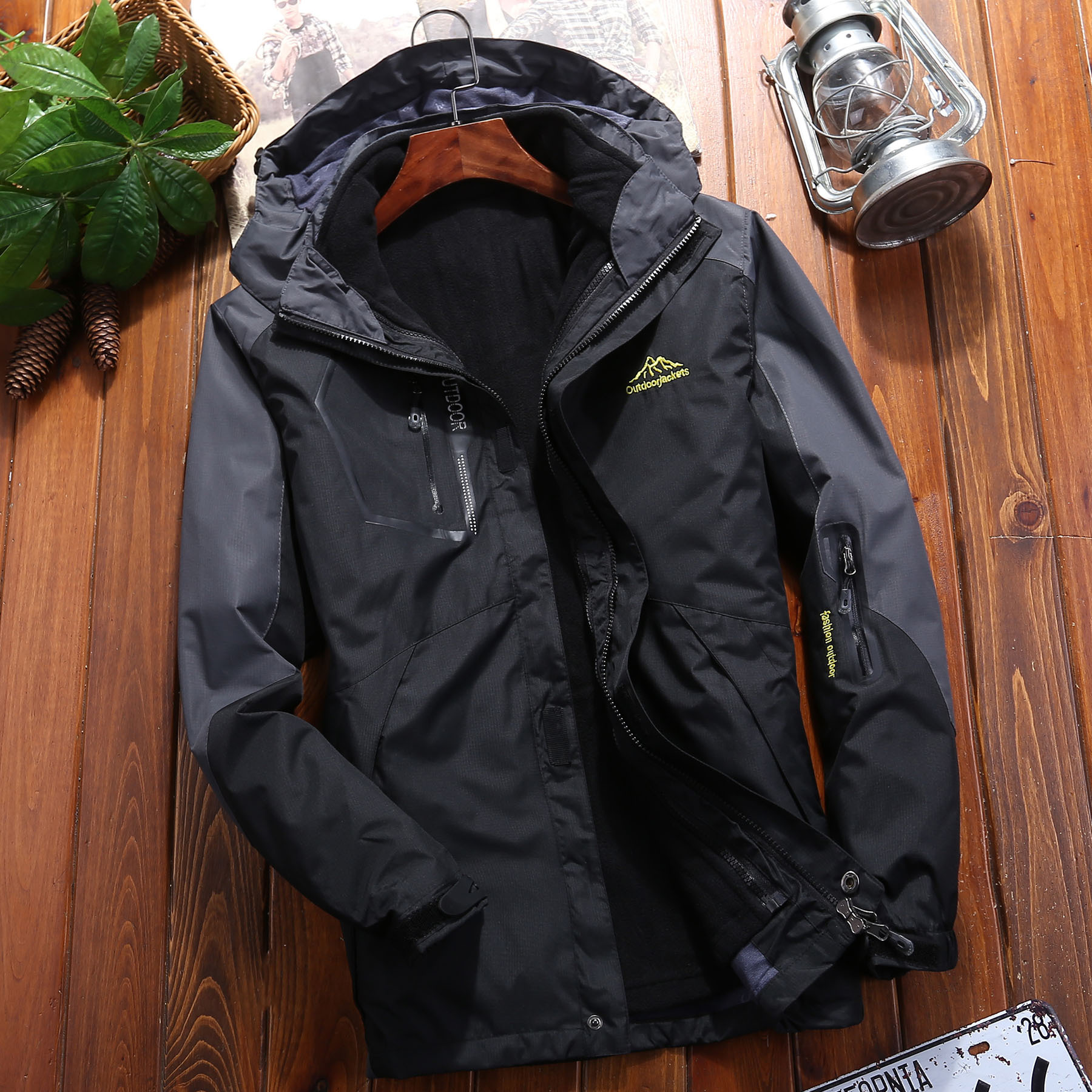 Al Aire Libre otoño e invierno marca de moda chaqueta hombres y mujeres tres en uno desmontable de dos piezas forro polar traje de Montañismo al por mayor