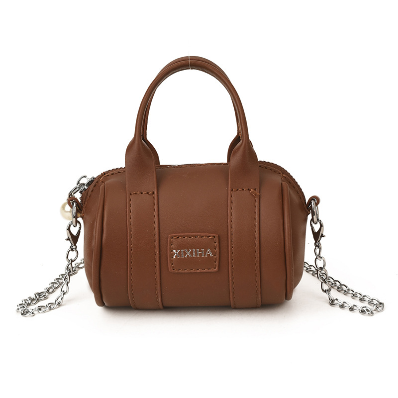 Bolsa de almohada cilíndrica de moda de contraste para niños y niñas bolsas de cadena mini lindas para bebés 2026 nuevas bolsas de accesorios para niños