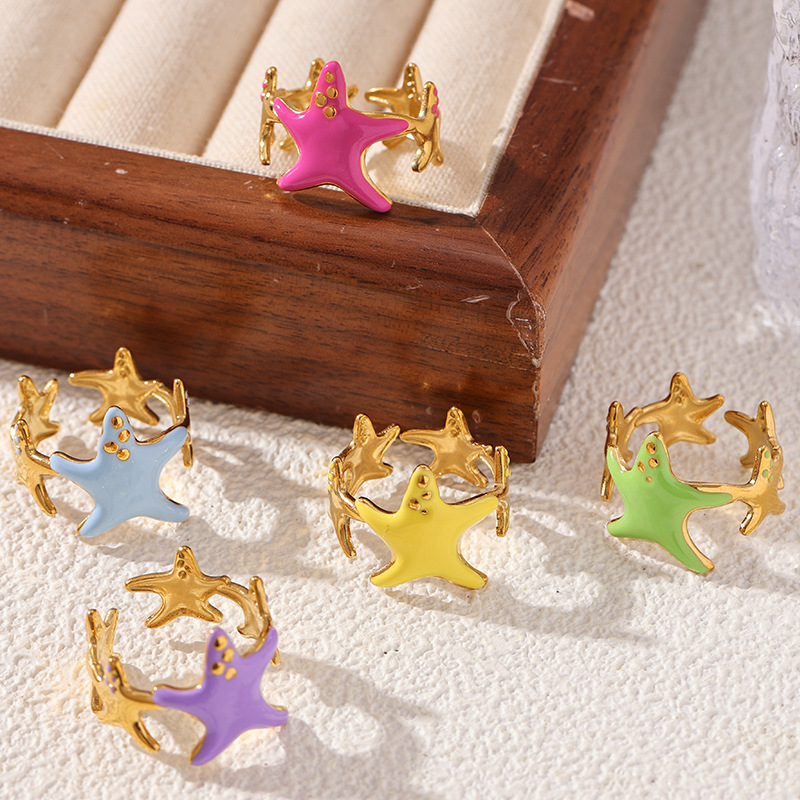 TENA Europa y los Estados Unidos transfronterizos estrella de mar esmalte de color goteo de aceite anillo nicho de alto nivel sensación de vacaciones joyería al por mayor