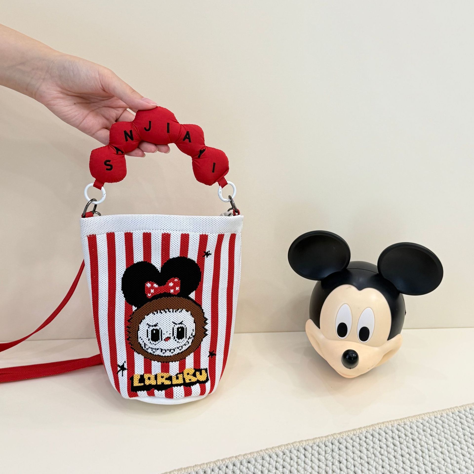 2026 primavera y verano nuevo bolso de cubo de pintura creativo portátil gran espacio de aire de dopamina alta sensación mochila