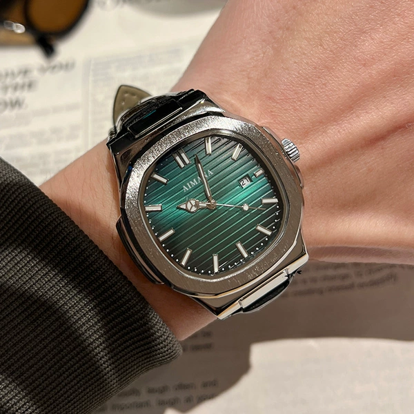 Silver shell green face black belt