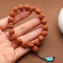 正宗龙纹桃核雕刻钟馗手串