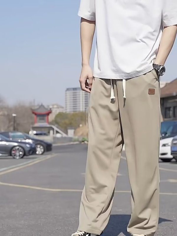 シャツの少ない服装の氷のズボンの夏の新型の香港風のゆったりした大きいサイズのストレートの広腿のズボンの垂れ感の薄いタイプのカジュアルなズボン|undefined