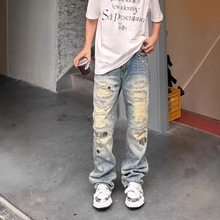 跨境高街美式复古做旧脏洗破洞刀割刺绣牛仔裤男潮牌宽松微喇裤子
