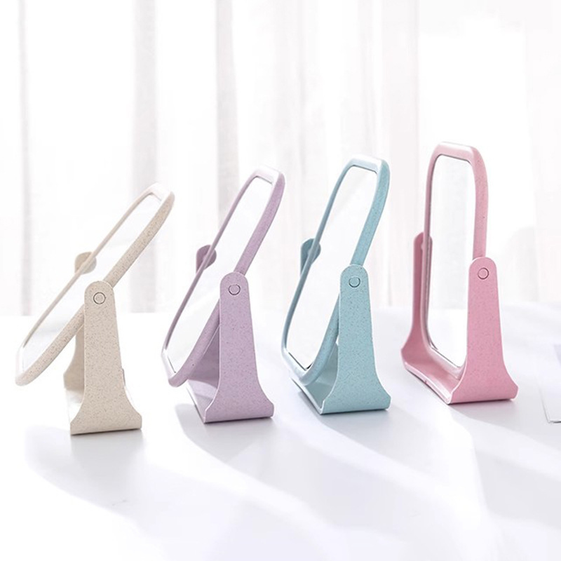 Espejo de maquillaje de doble cara plegable