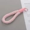 Plush pink lanyard with round buckle