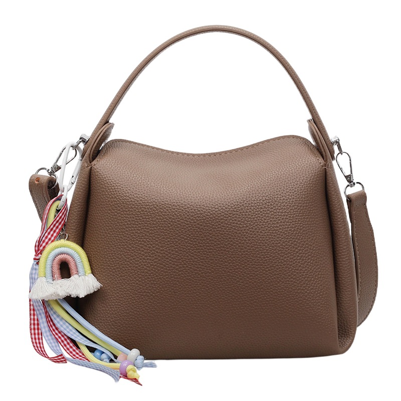 Bolso pequeño de mano para mujer 2025 nuevo bolso de mensajero de hombro de moda de lujo ligero bolso de caja de almuerzo de alta gama de nicho bolso de cubo