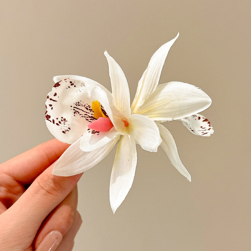 Super inmortal puro deseo mariposa orquídea Liuhai clip de flores para el cabello de la mujer atmósfera superior vacaciones en el mar fotos clip de flores para el cabello
