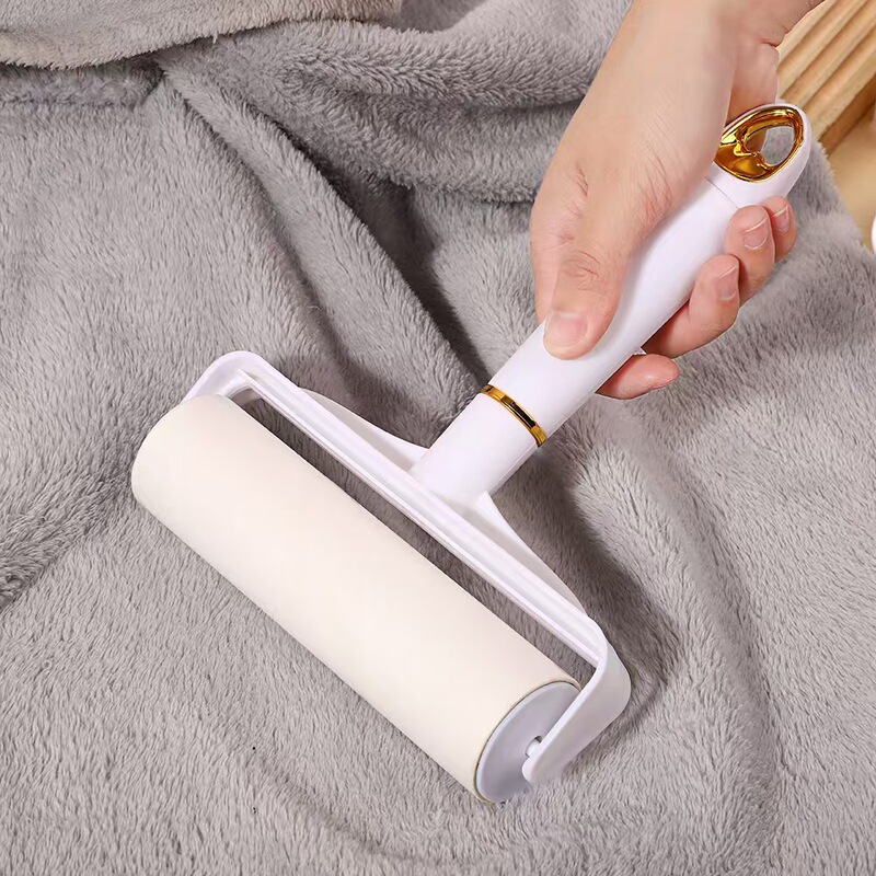 家庭用短柄ローラー式毛取り器、剥がせる交換用紙芯付き、衣類の毛や髪の毛を吸い取る掃除ブラシ|undefined