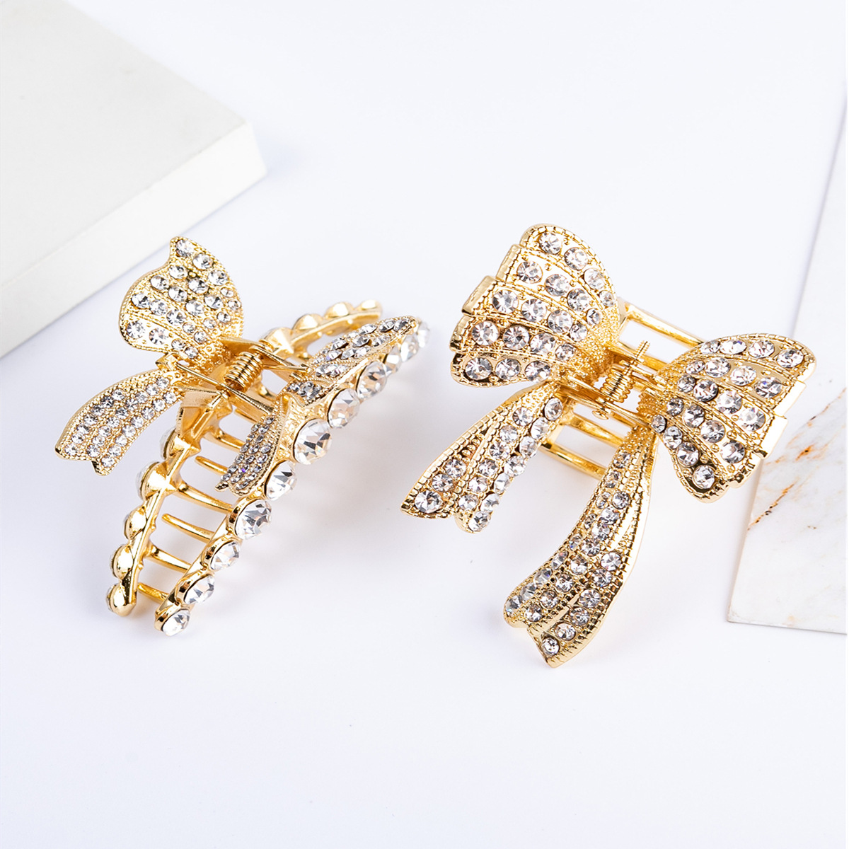 Women's Fashion Letter Bow Knot Alloy Plating Inlay Artificial Pearls Artificial Diamond Hair Claws display picture 5