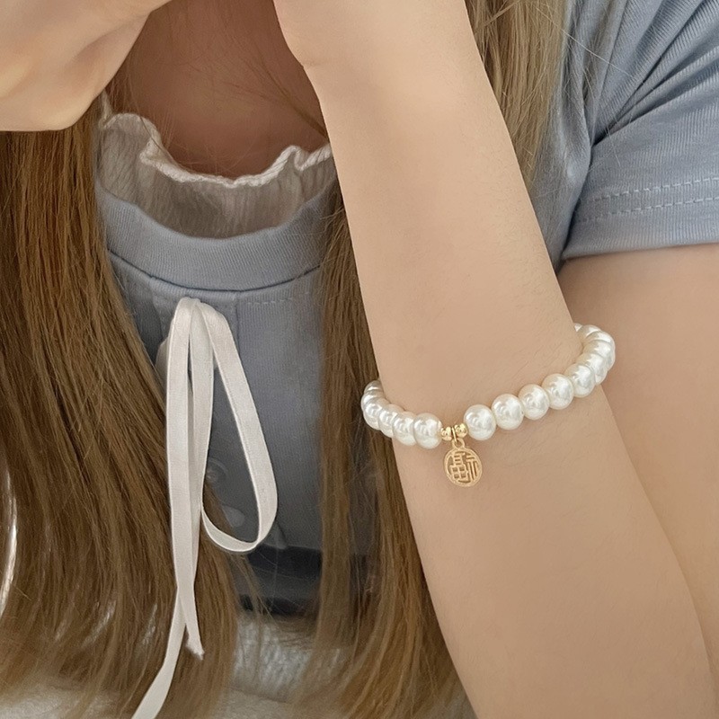 フランスのレトロでシンプルな真珠の弾力性のブレスレット|undefined