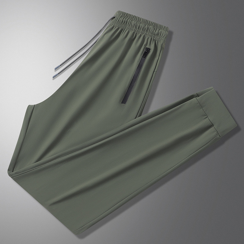 Pantalones de verano para hombres pantalones casuales pantalones deportivos sueltos nuevos tipos coreanos de hielo húmedo delgado pantalones de aire acondicionado pantalones