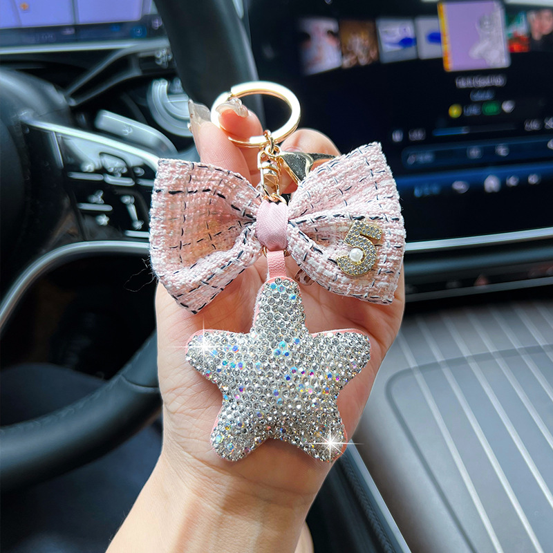 Cerámica creativa con diamantes de arcilla de cinco puntas arco pequeño llavero de viento fragante nuevo cuero estrella bolsa decoración colgante