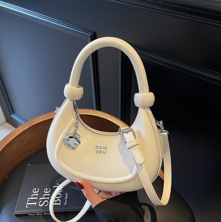 Bolsos de diseño de nicho de tendencia transfronteriza para mujer 2025 nuevo bolso de hombro retro salvaje bolso de axila de moda occidental