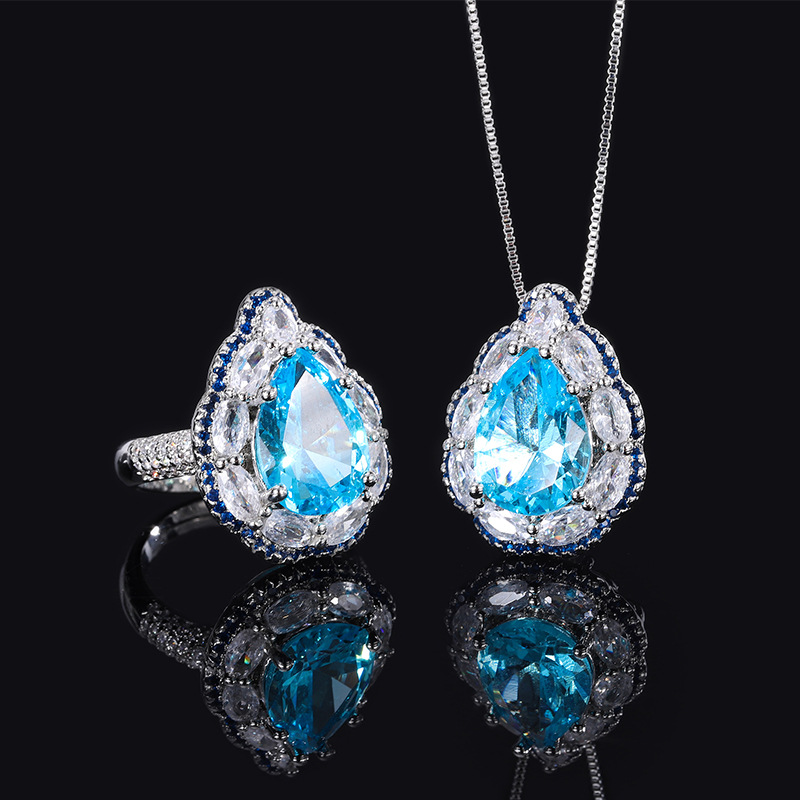 Zhuang sheng joyería al por mayor europea y americana simulación topa azul estilo retro diamante gota de agua las mujeres traje principal piedra 10*14