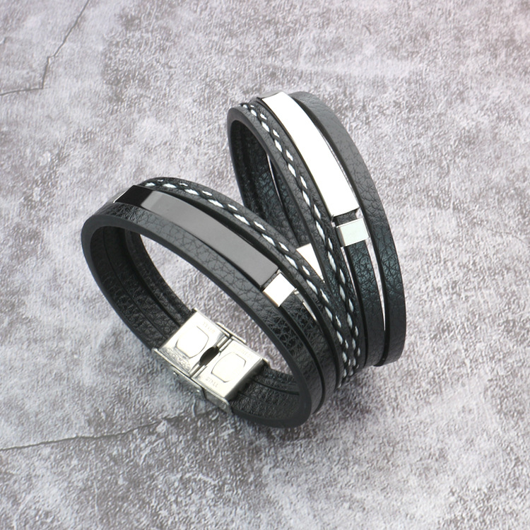 New spot lettering men's titanium steel woven leather bracelet men's and women's lovers European and American popular leather bracelet