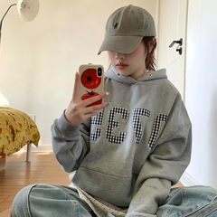 趣味のファッションの流行のアルファベットのプリントの運動のレジャーは帽子のカーディガンの女子学生のゆったりしている百合の上着のパーカーのファッションです。