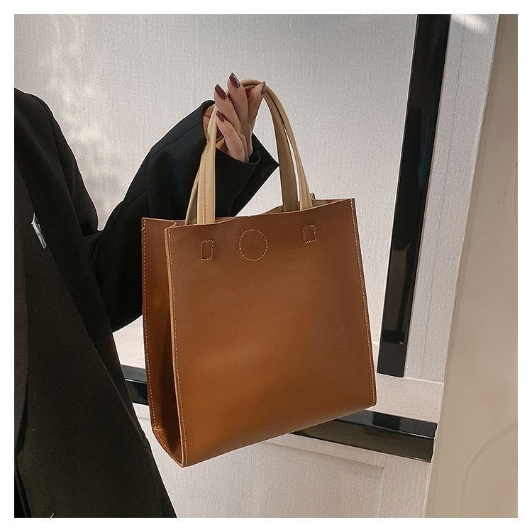 2024 New Bags Korean Version Versatile Commuting Bags Large Capacity Portable Tote Bag Temperament Popular Women’s Bag Vertical Style_voghion.com