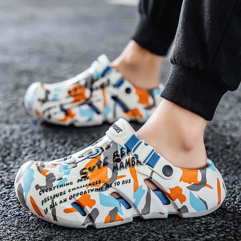 Zapatos con agujeros para hombres nuevo estilo verano al aire libre graffiti Baotou sandalias antideslizantes EVA pisando la mierda sandalias y zapatillas Sandals