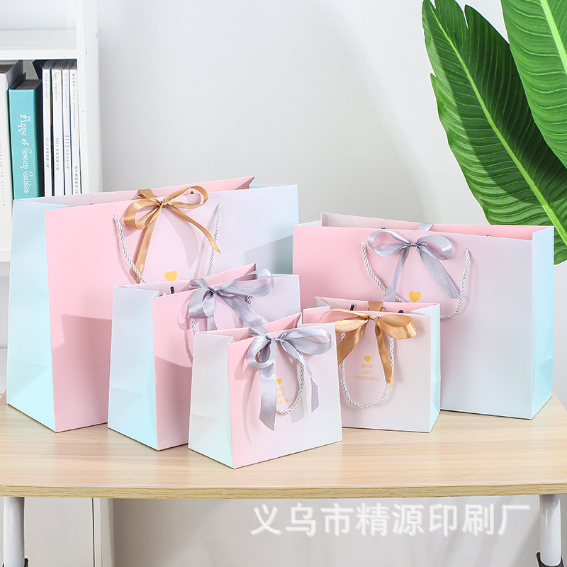 Nueva bolsa de regalo ins estilo bolsa de embalaje bolsa de regalo degradado tienda de ropa bolso de papel bolsa portátil de regalo