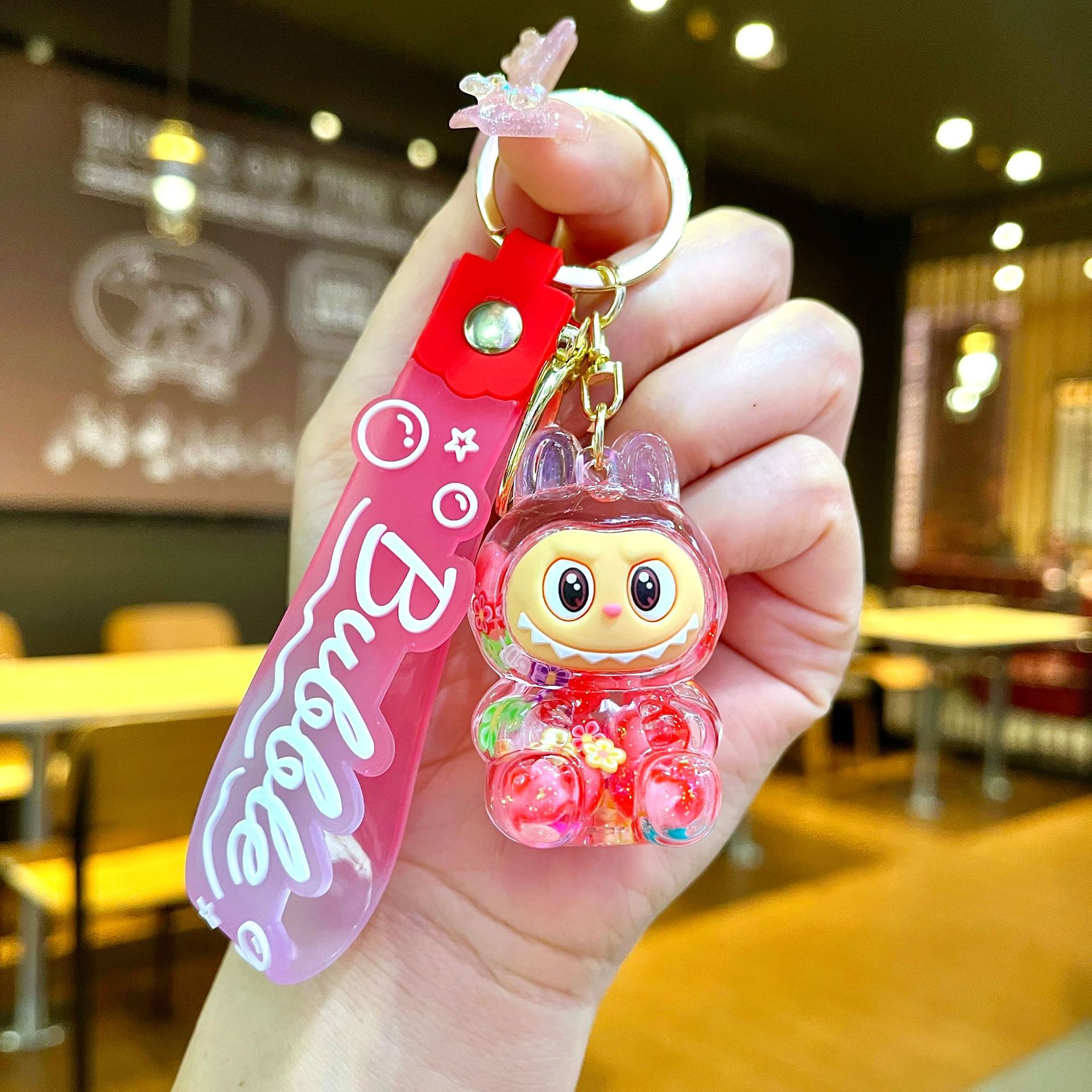 Llavero red acrílico con arena flotante