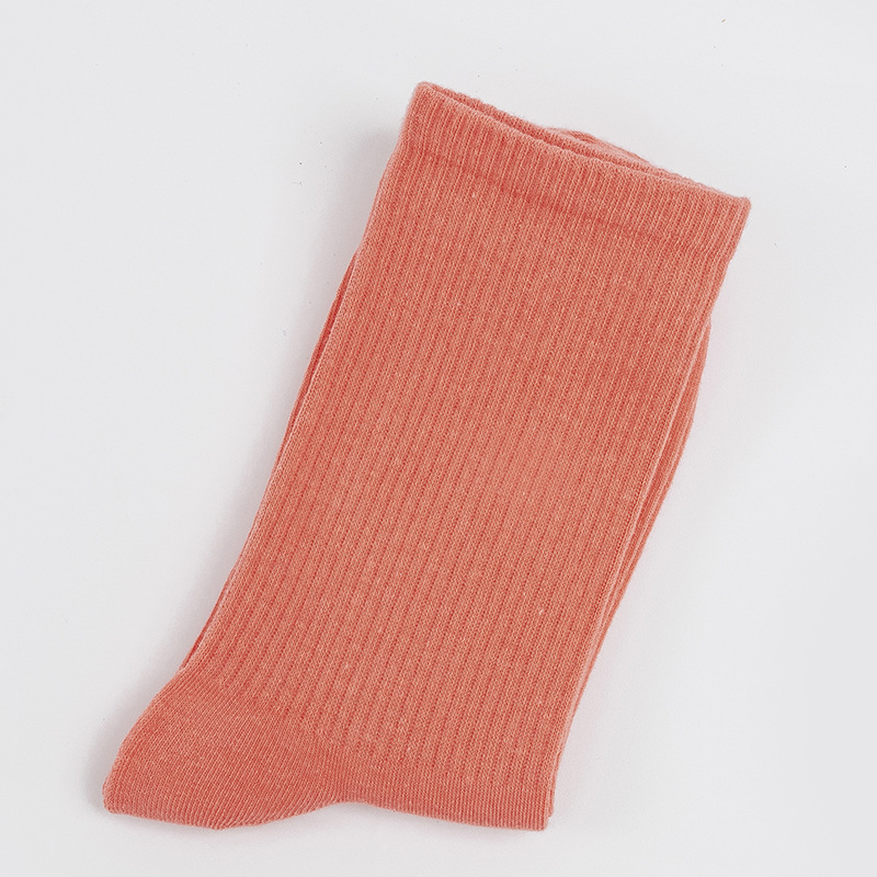 Calcetines de mujer para primavera y otoño, calcetines de algodón de color liso, versátiles y a la moda, calcetines holgados, calcetines de longitud media, calcetines deportivos que absorben el sudor, venta al por mayor.