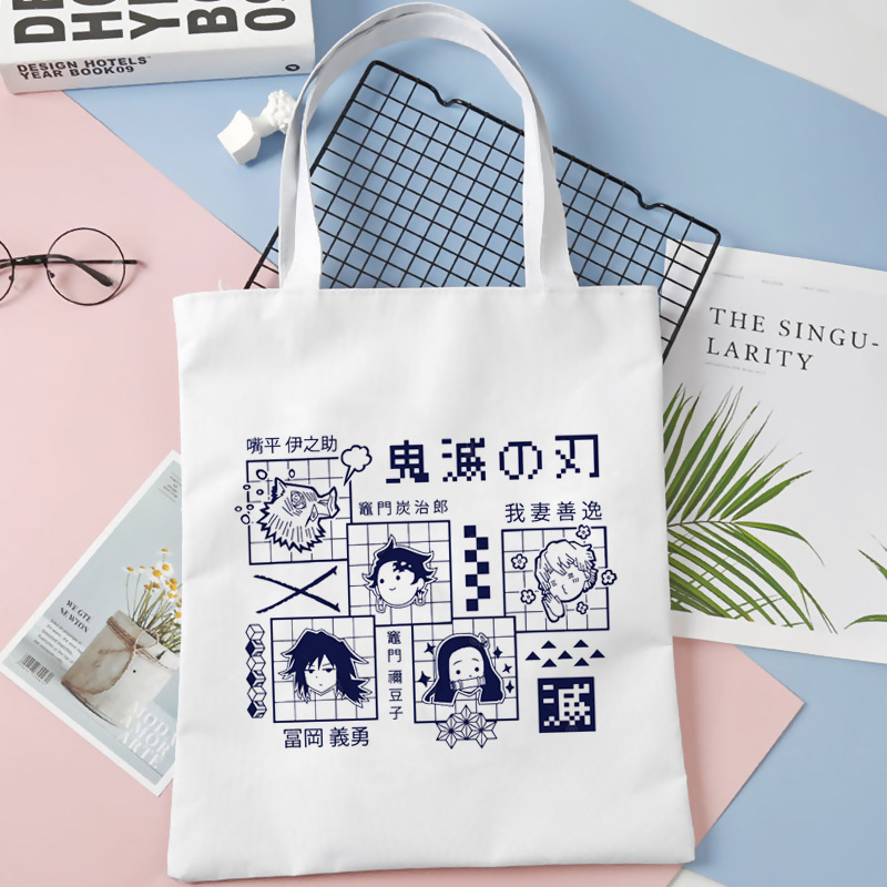 Comercio exterior transfronterizo Demon Slayer impresa bolsa de lona Harjuku bolsa de hombro bolsa de compras portátil de moda para estudiantes