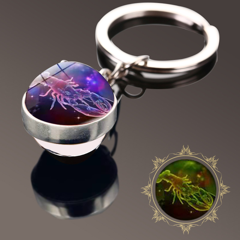 Amazon nuevo luminoso doce constelación tiempo gema de doble cara bola de cristal llavero colgante pequeño regalo