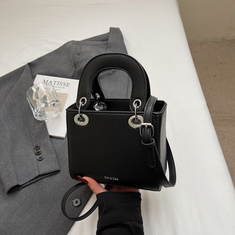 Bolso de mano de alta gama de comercio exterior para mujer 2025 nuevo bolso de hombro de todo fósforo de nicho de estilo occidental bolso de mensajero de moda