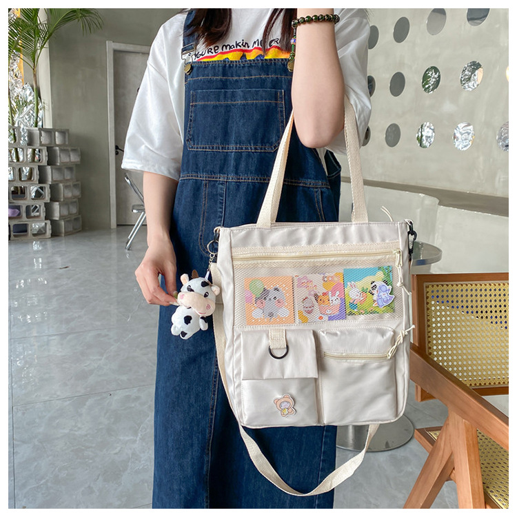 Large-capacity Japanese-style single-shoulder canvas bag for girls, versatile crossbody, ins, a tote bag for junior high school students' classes, and a schoolbag for after-school tutoring undefined