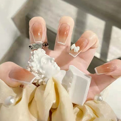 Fashionable nail art with a gradual caramel color and butterfly bow design, suitable for mature women, can be wholesaled as finished products, detachable.