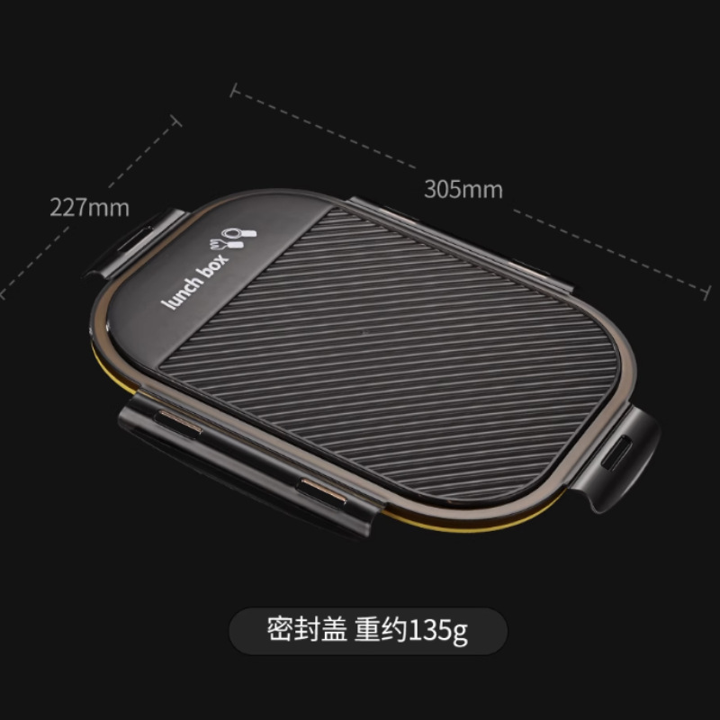 316ステンレス製の弁当箱のサラリーマンは食事を持っています。|undefined