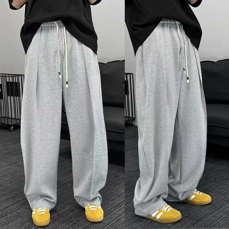 Та же весенняя новая мужская тяжеловесная защитная брюка простой и стильный дикий свободный спортивный ятаган повседневные брюки