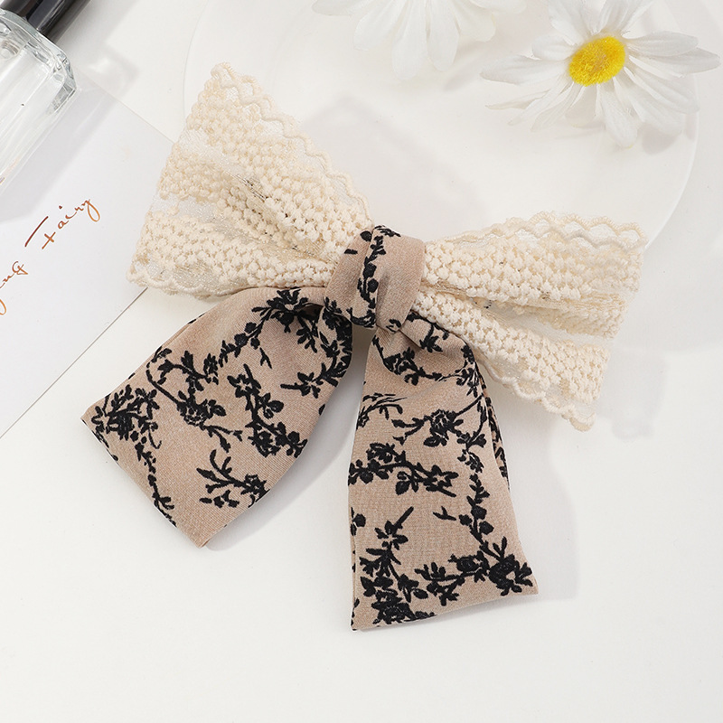 Fashion Lace Bow Metal Spring Black Hair Clip Wholesale display picture 6