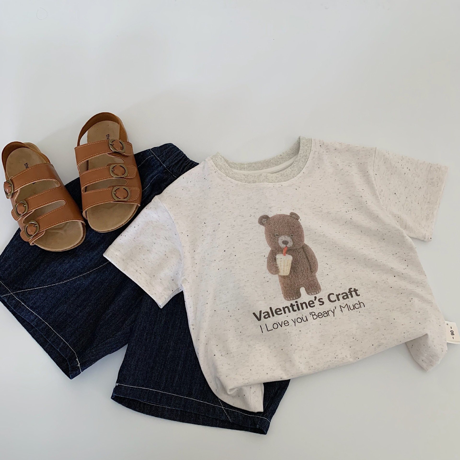 Mai Bao niños de verano camiseta de mangas cortas 2025 nuevo estilo coreano para niños y niñas de dibujos animados oso jersey para niños