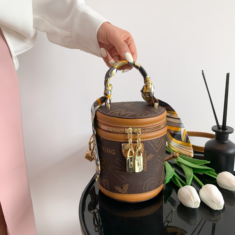 Baigou bolsa al por mayor de las mujeres bolsa de cubo portátil 2023 transfronterizo nueva carta impresa bufanda hombro bolsa de mensajero