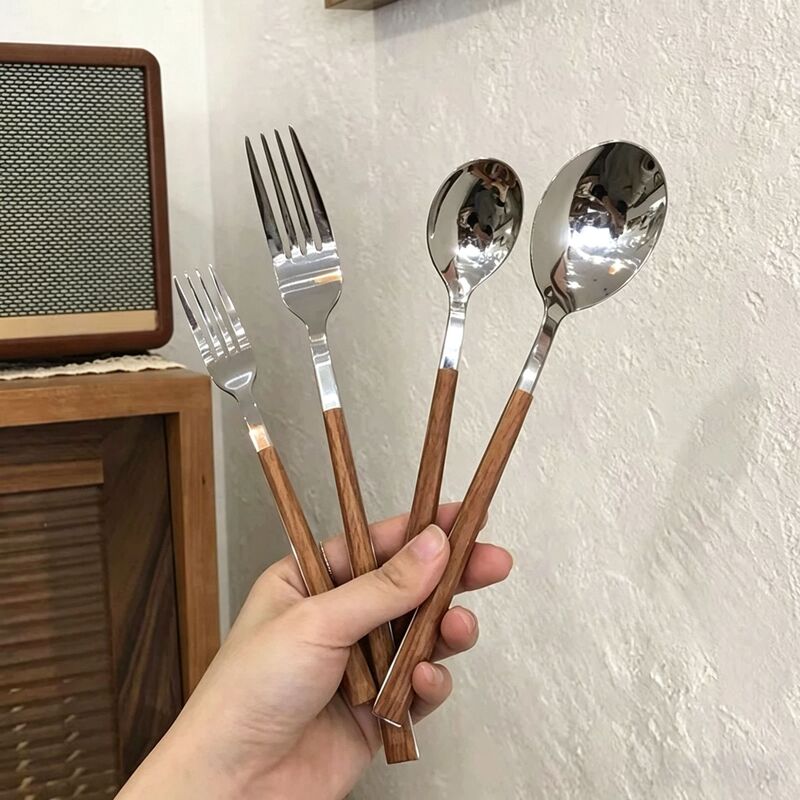 Retro-style portable stainless steel cutlery set, including chicken wing wood chopsticks, steak knife, and stainless steel spoon and fork for home use, a Western-style dining set Retro-style portable stainless steel cutlery set, including chicken wing wood chopsticks, steak knife, and stainless steel spoon and fork for home use, a Western-style dining set