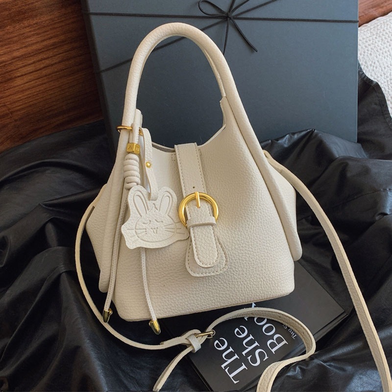 Bolsas de mujer tendencia de hombro solo para trabajar bolsas coreanas de cubo sensación de bolsas de viaje de moda nueva bolsa interior para mujeres