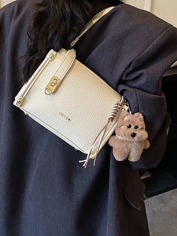 Bolsos retro retro de alta calidad para mujeres 2026 nueva textura lichi bolso pequeño estilo coreano simple mochila de hombro