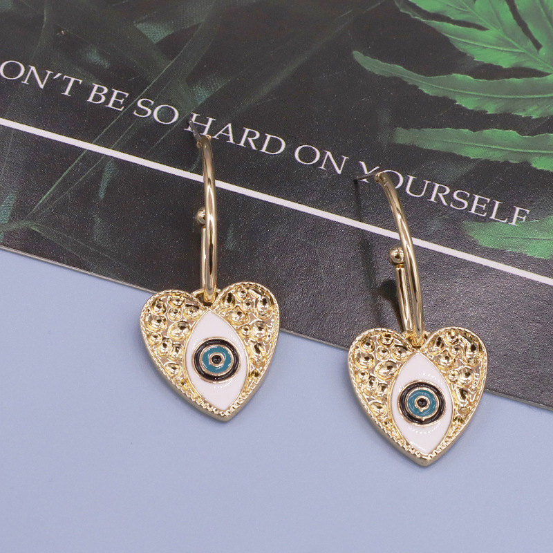 Retro Personality Alloy Turkish Devil Eye Heart Earrings Ethnic Style Earrings display picture 4