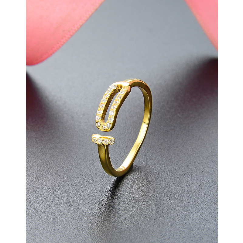 Con incrustaciones de circón chapado en oro s925 anillo abierto de plata estilo japonés y coreano simple estilo Chanel hueco anillo de las mujeres al por mayor