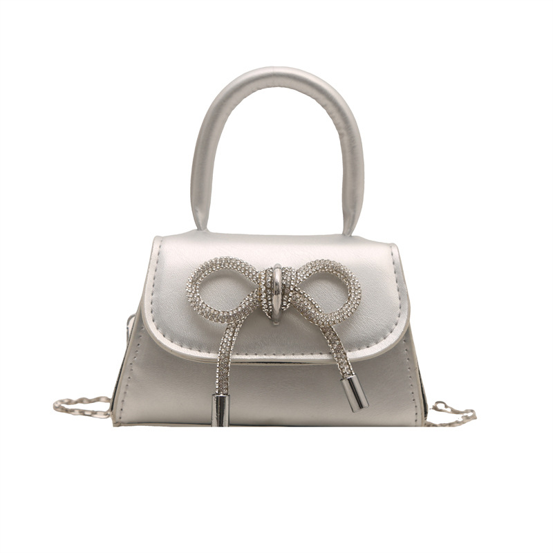 Ins nicho bolso de textura francesa mujer 2025 primavera nuevo arco bolso pequeño bolso de hombro de estilo occidental