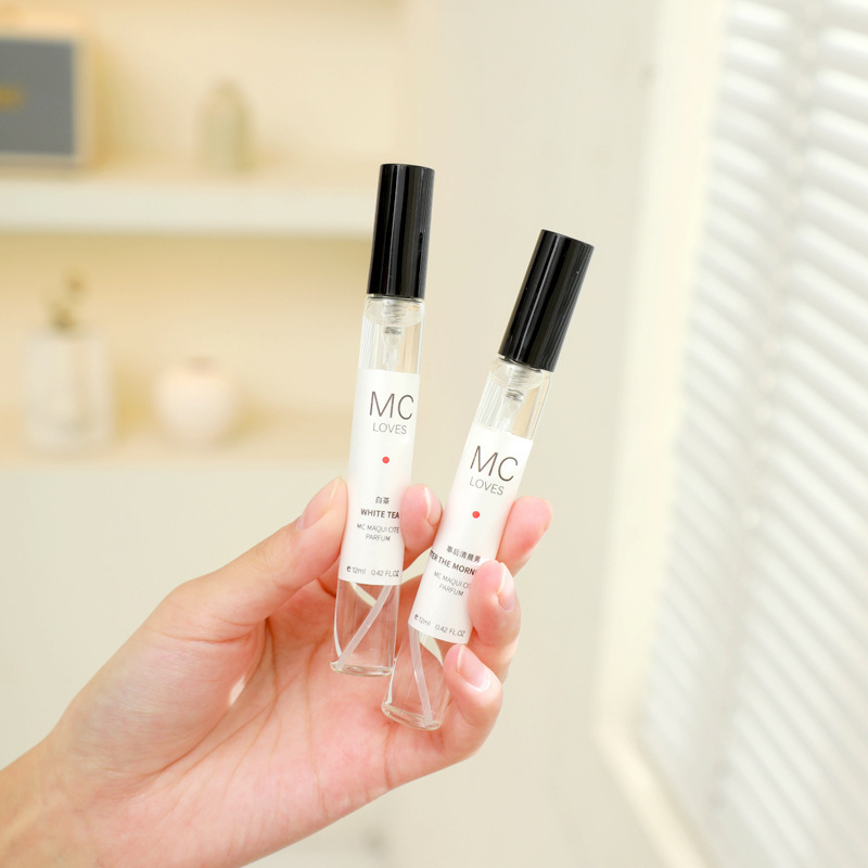 Yulong Tea Fragrance Silver Mountain Spring Perfume Girls Lasting Light Fragrance Student Night Market Wholesale and Retail Shake Tone Explosions 12ml