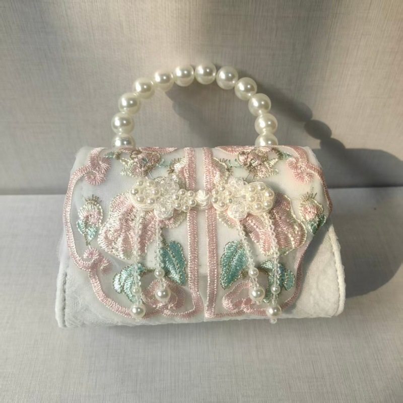 2025 primavera y verano estilo caliente moda casual niños dulces bolsa de gelatina mini bolso de mensajero de un solo hombro variedad al por mayor