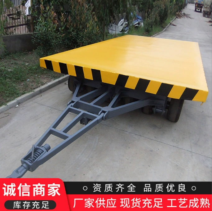 Тягач с платформой для перевозки крупнотоннажных грузов, четырехосный тягач с платформой для перевозки больших грузов.