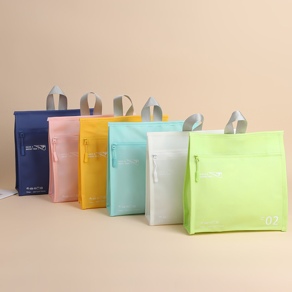 Handheld capacious waterproof cosmetic bag to go out for traveling