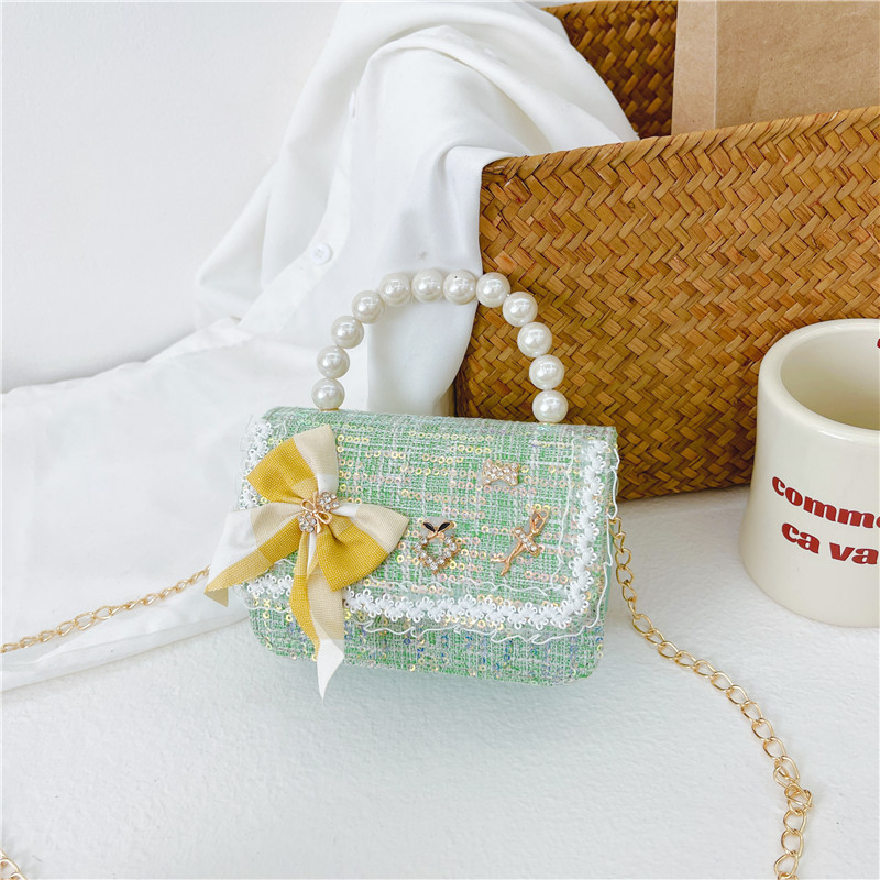 Bolso de hombro de los niños nuevo comercio exterior al por mayor bolso de La Perla de las niñas moda coreana pequeña princesa lentejuelas bolsa de mensajero