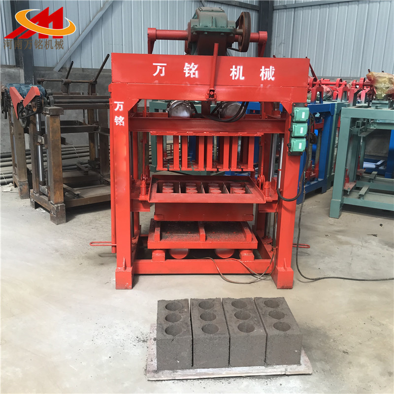 Exportación de Asia central y semiautomática máquina de formación de bloques huecos pequeña máquina de ladrillo de cemento sin quemar máquina de ladrillo de residuos de construcción