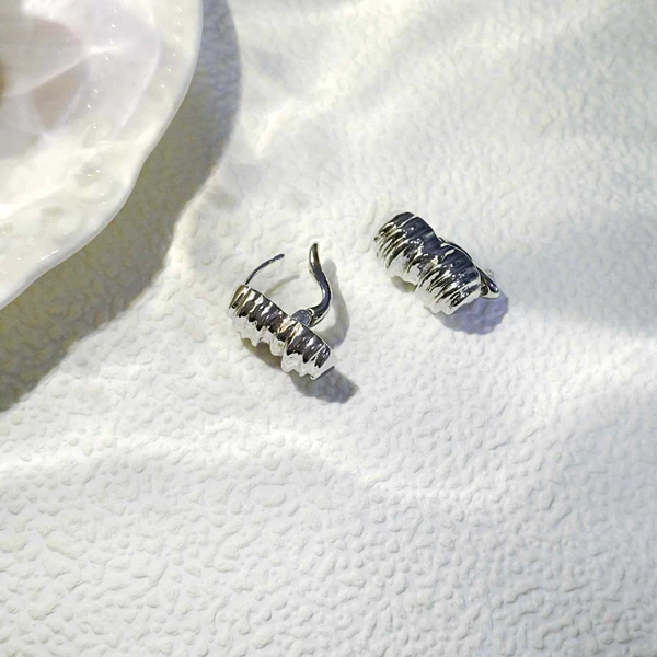 Silver peanut ear buckles